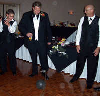The Groomsmen held Scott while Angela's father attached a ball & chain!